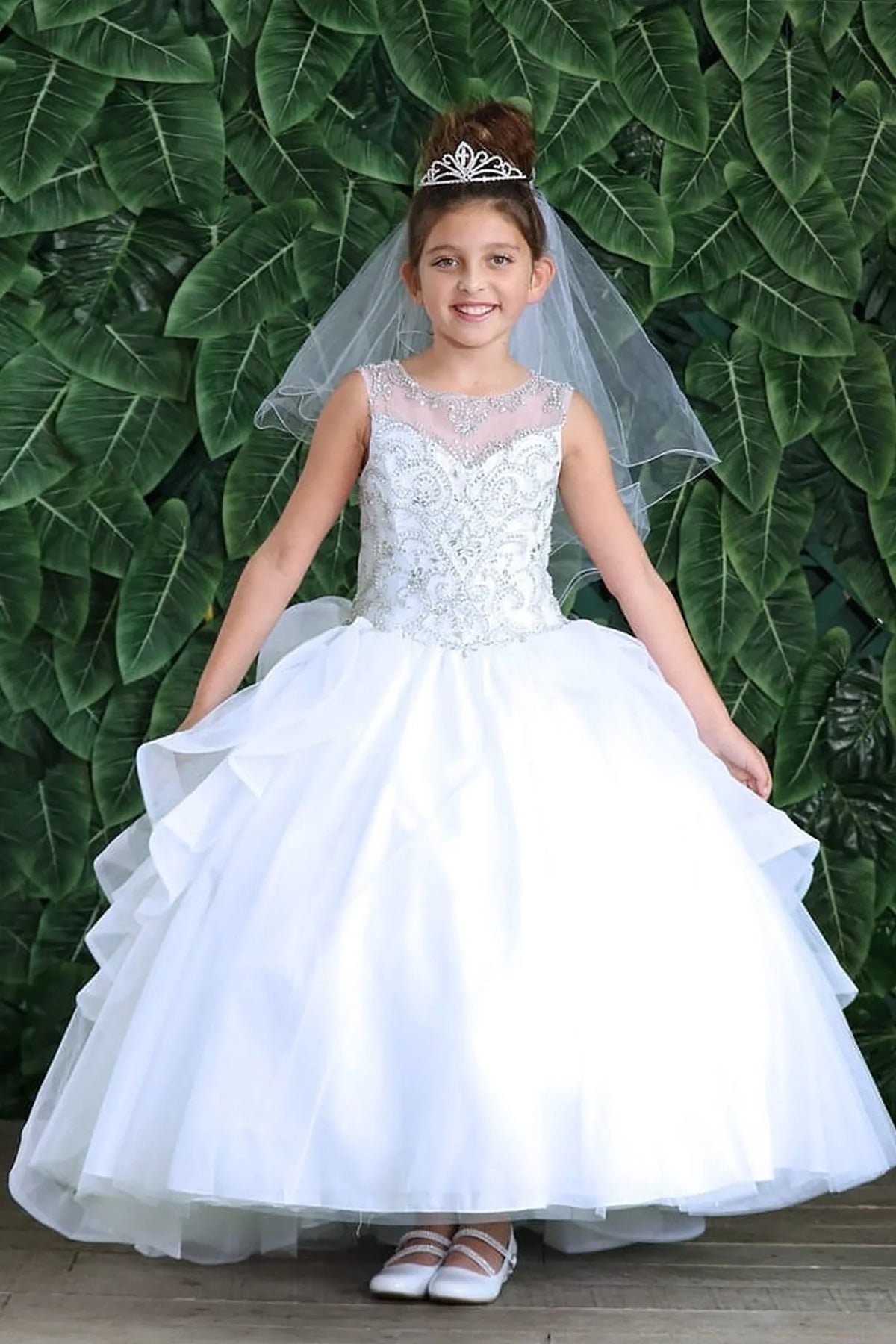 Rich texture defines, the White mini quince dress showcases crystal-embellished sleeveless bodice and cascading layered ruffle skirt.