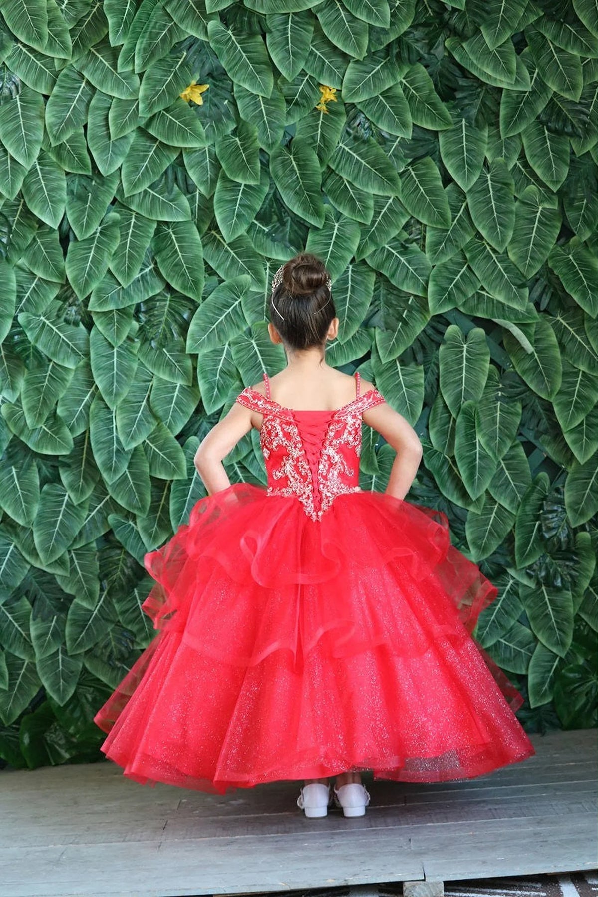 Another full view presents layered formal skirt with dimensional tiers on the Red mini quince dress.