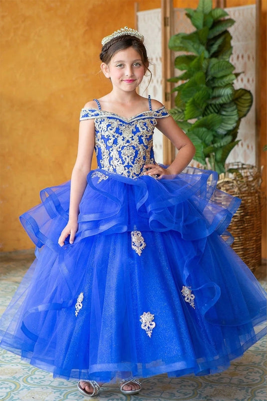 The formal silhouette presents, the Royal Blue mini quince dress showcases sparkling jeweled fitted bodice and layered formal skirt with dimensional tiers.