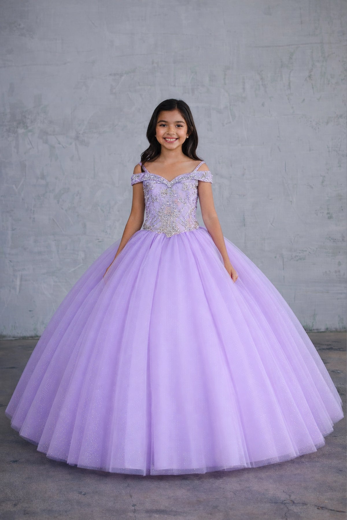 Delicate accents highlight, the Lilac/Gold mini quince dress showcases metallic embroidered off-the-shoulder bodice and full tulle skirt with coordinating two-tone detail.