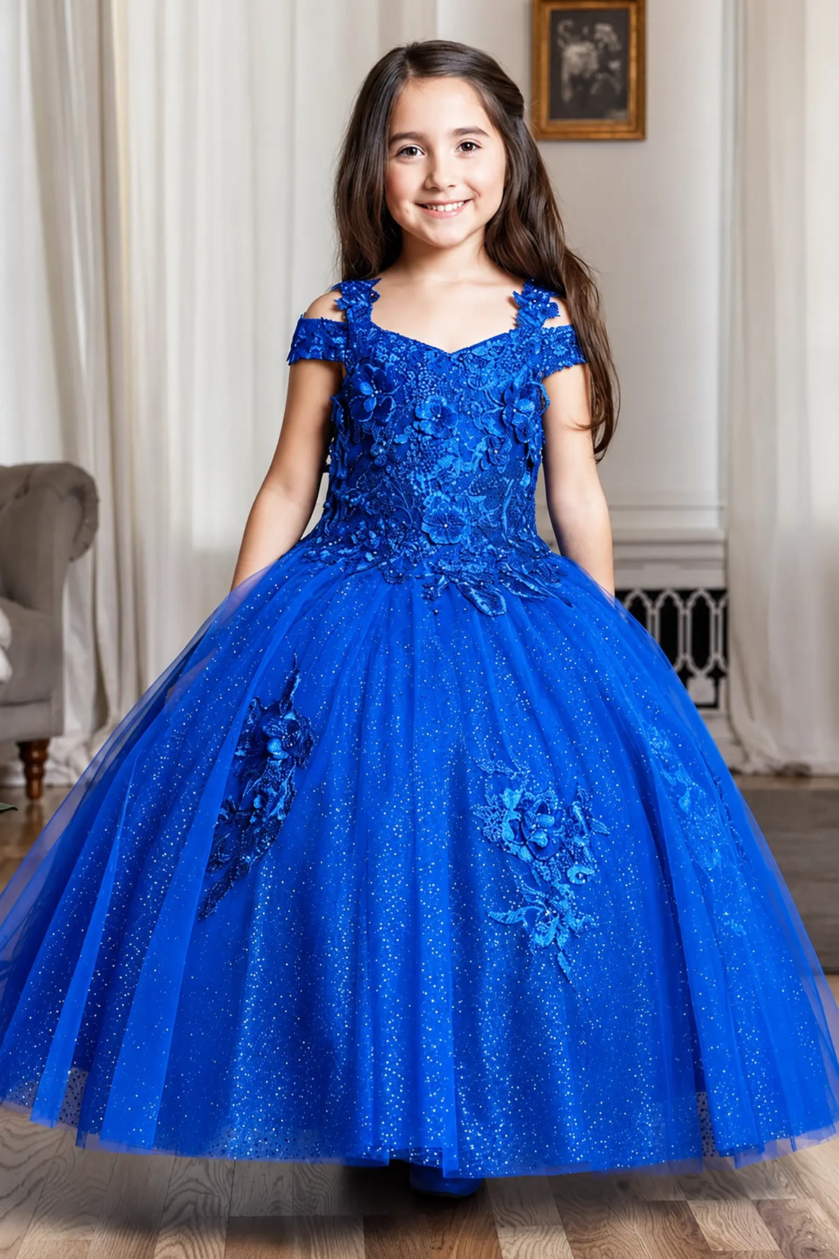 Front view of elegant royal blue mini quince dress with shiny tulle bodice and voluminous short skirt.