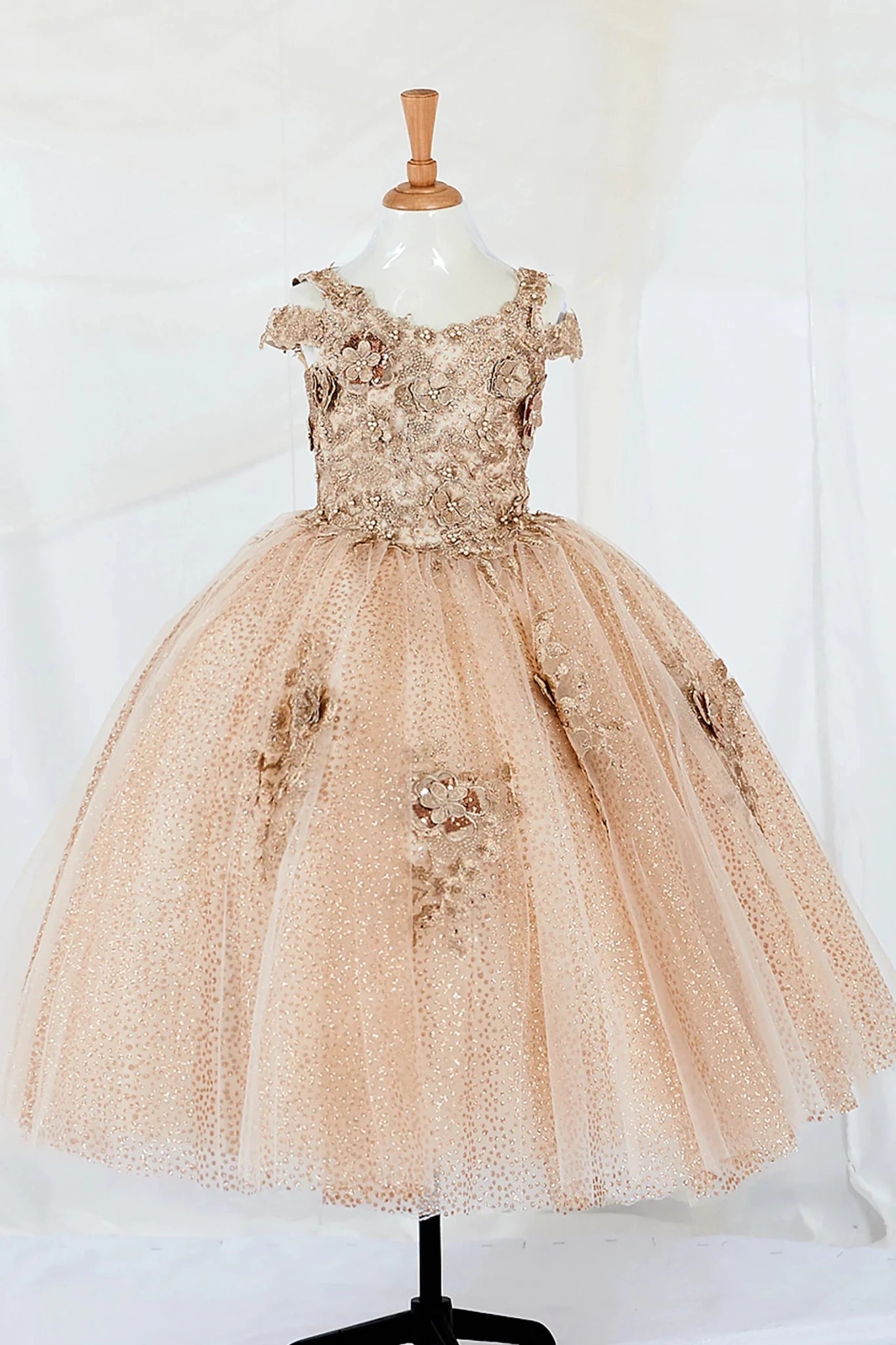 champagne mini quince pageant mini quince dress with tulle skirtand floral appliques.