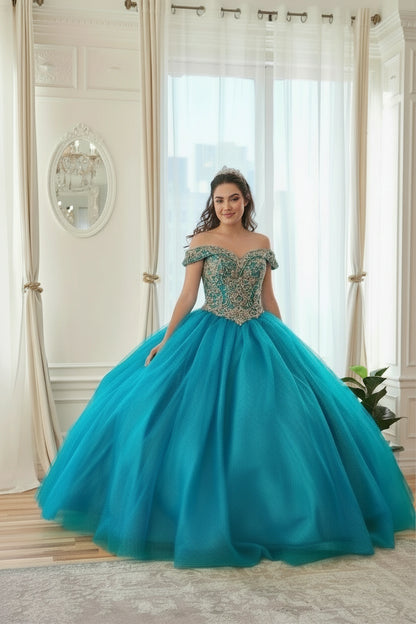 Decorative embroidery outlines the off-shoulder bodice above the full skirt of the Jade/Gold quinceañera ball gown.