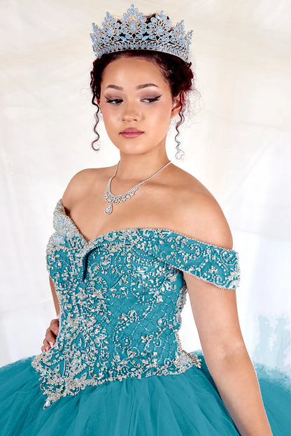Close-up of the ornate floral embroidery along the neckline of the Jade/Gold quinceañera ball gown.
