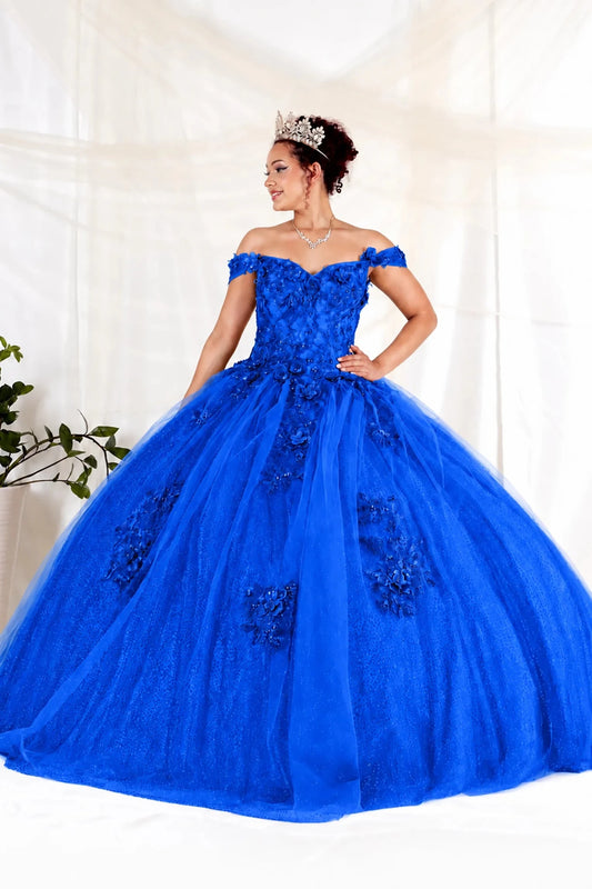 Royal Blue quinceañera dress showcases dimensional floral appliqués and glitter accents above full tulle ball gown skirt.