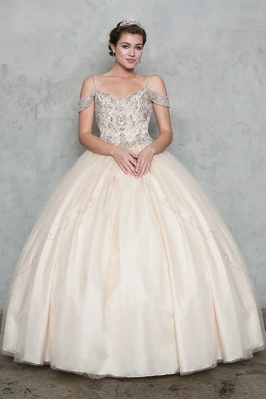 Champagne quinceañera dress showcases beaded off-the-shoulder bodice above smooth full ball gown skirt.