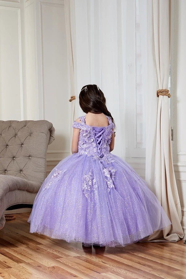 Kid standing back-facing in lilac mini quince dress with lace-up closure, shiny tulle bodice, and flared short skirt