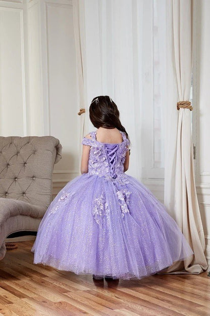 Kid standing back-facing in lilac mini quince dress with lace-up closure, shiny tulle bodice, and flared short skirt