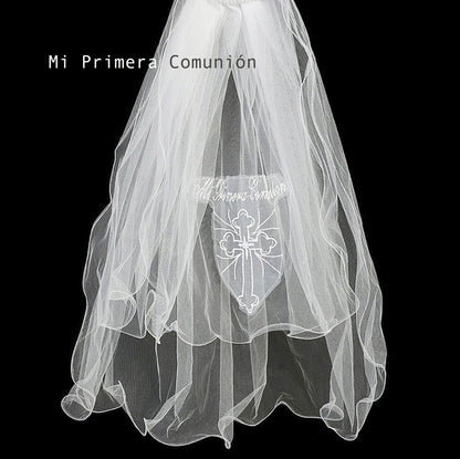 Refined styling highlights white lace cross Virgin Mary embroidered first communion lace applique.