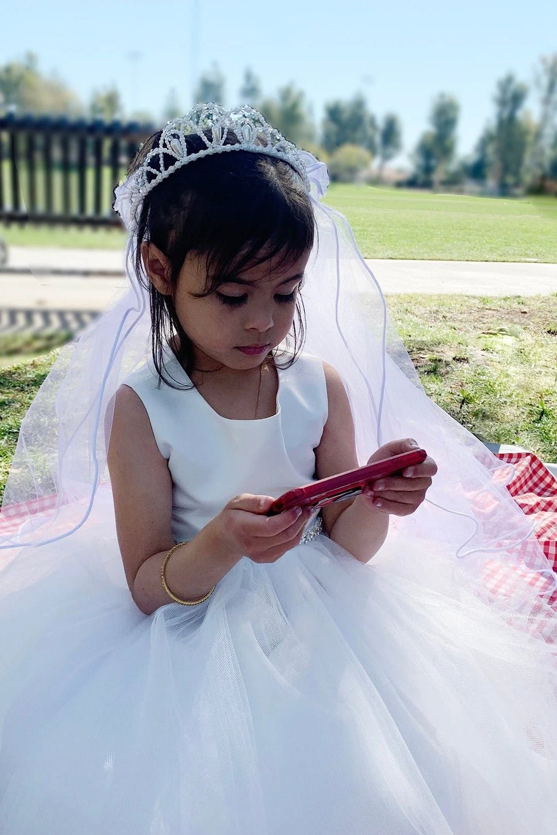 White pearl rhinestone flower girl and first communion tiara and two-tier veil.