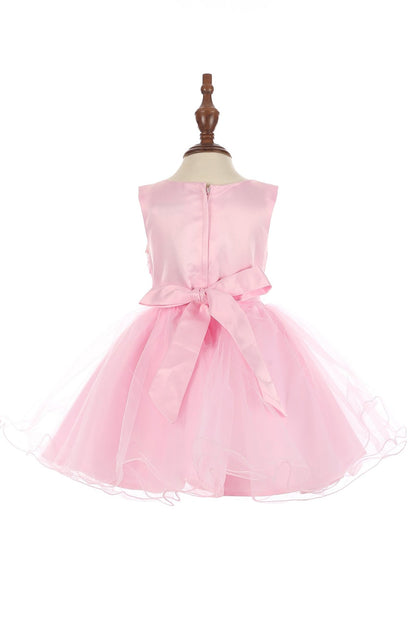 Pink dress on a mannequin against a white background