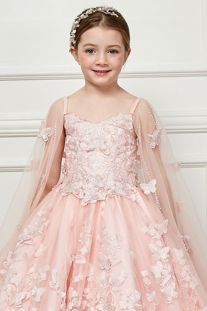 Zoomed front view of a blush kids mini quinceanera dress highlighting butterfly floral appliques, gem accents, and glitter tulle skirt