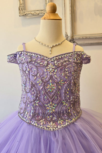 Zoomed front view of a lilac kids mini quinceanera dress highlighting gem-embellished bodice, floral detailing, and glitter tulle skirt