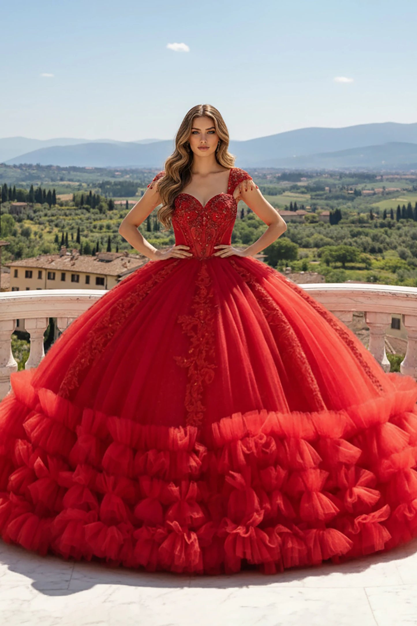 Red quince ball ball gown with floral details and ruffled hem for a dramatic formal look