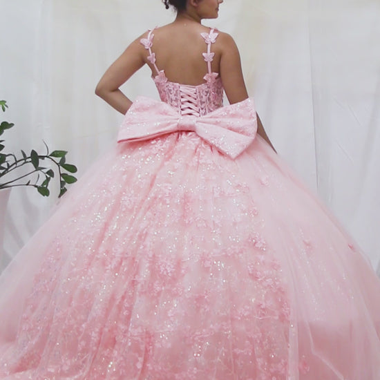 video of blush butterfly quince ball gown with extra big bow