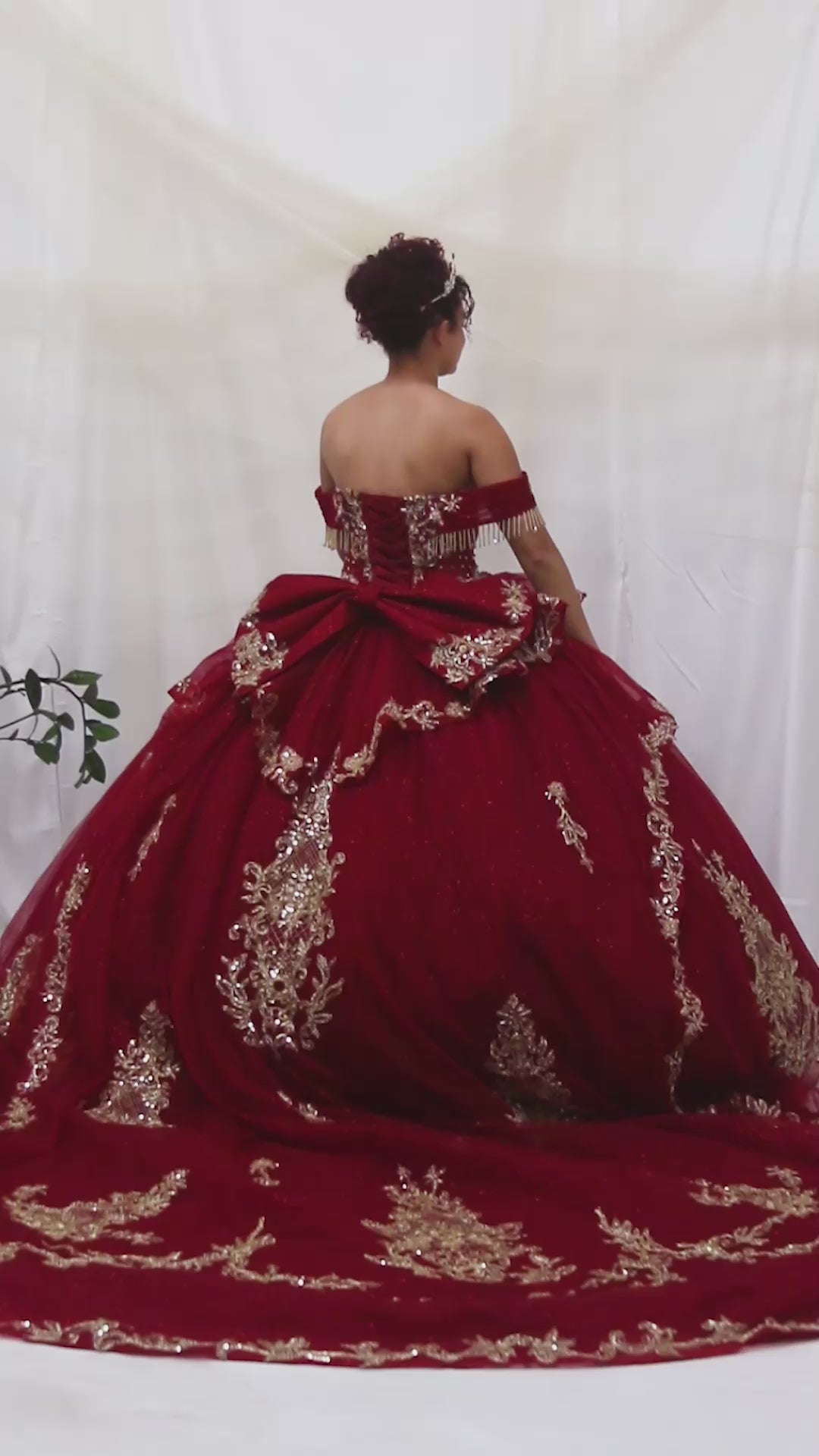 Video of Burgundy Quinceañera Dress with Gold Embroidery, Beaded and Fringe Embellished Bodice