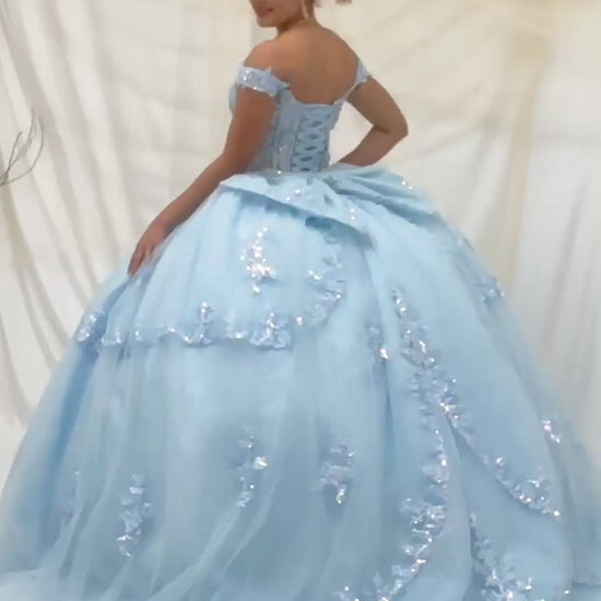 Video of Bahama Blue Quinceañera Dress with Sheer Sweetheart Bodice, Floral Embroidery and Glitter Tulle