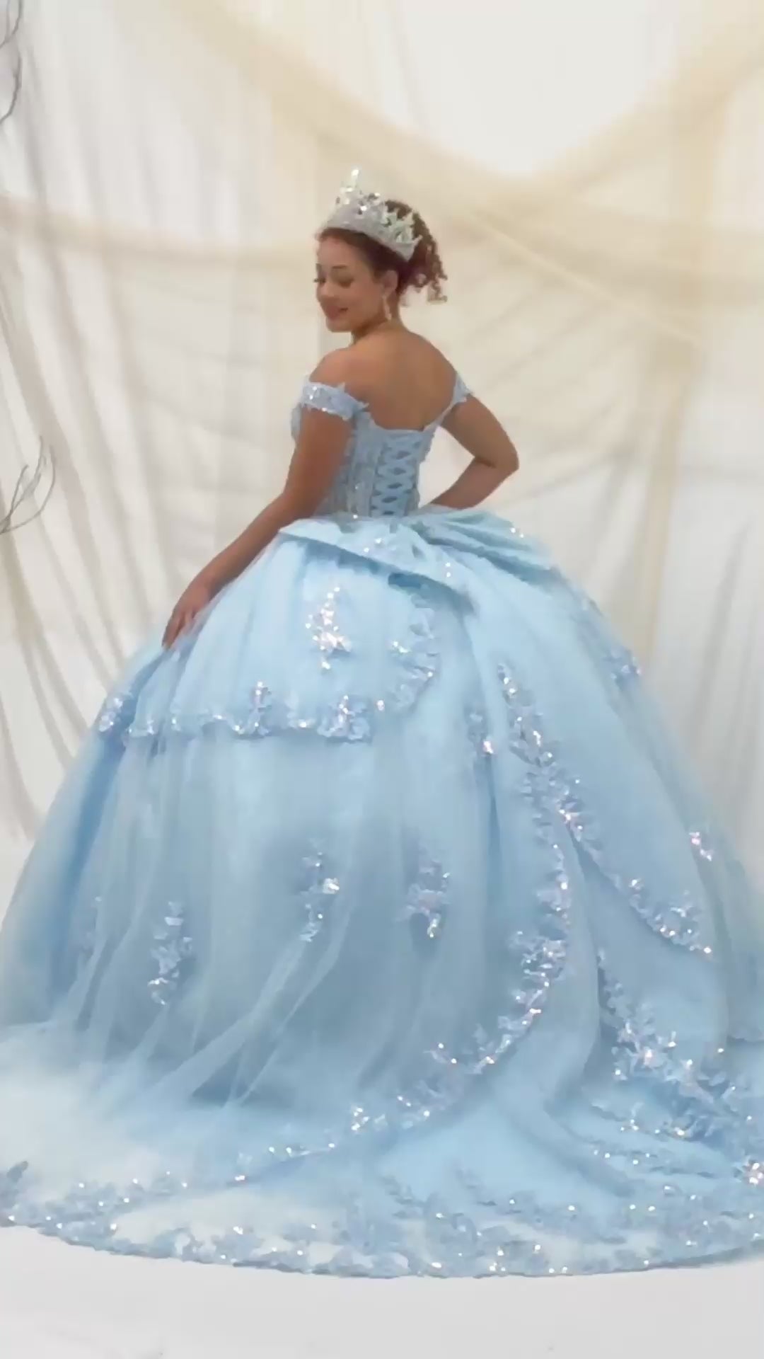 Video of Bahama Blue Quinceañera Dress with Sheer Sweetheart Bodice, Floral Embroidery and Glitter Tulle