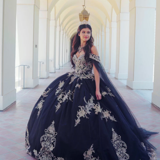 Quinceanera | Black with Gold Embroidered Lace with Stunning Cape Quince Ballgown dress - video of woman wearing dress