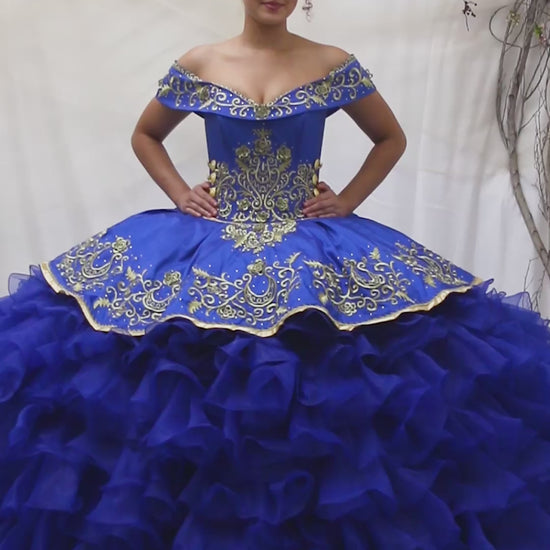 Video of Royal Blue Quinceañera Dress with Gold Embroidery, Ruffle Charra Design and Beaded Bodice