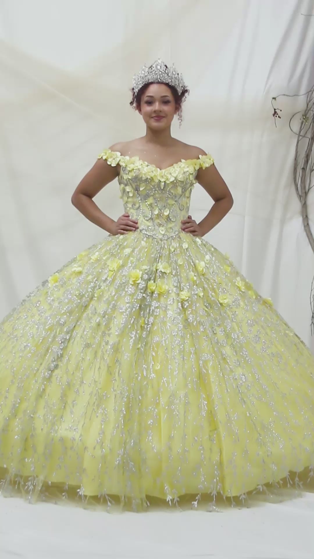 Video of Yellow Quinceañera Dress with Delicate Floral Appliques and Romantic Flowing Skirt