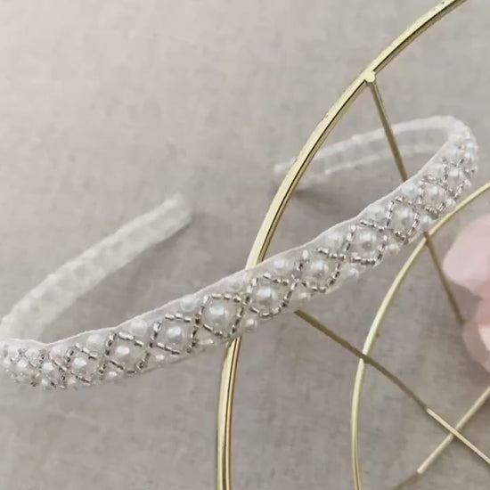 Handmade Pearl Flower Girl Headband - video of headband on metal basket