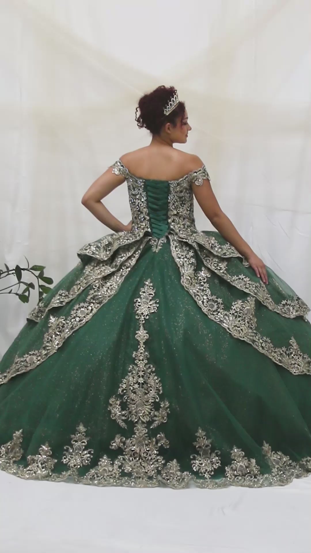 Video of Emerald green Quinceañera Dress with Embroidery Details and Layered Skirt