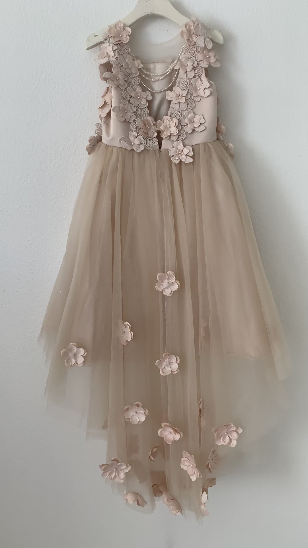 Champagne High-Low Tulle Dress with 3D Flower Lace Top Accentuated with Pearl Trim Flower Girl Dress | Flower Girl Dress - video of dress on hanger