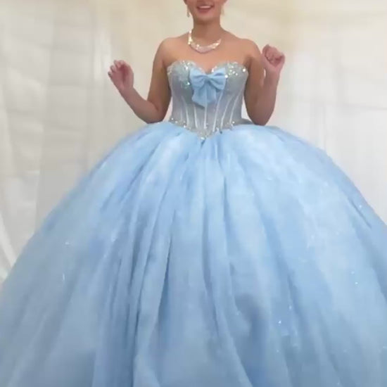 Video of Bahama Blue Quinceañera Dress with Crystal Beading, Glitter Floral Tulle and Front Bow Detail
