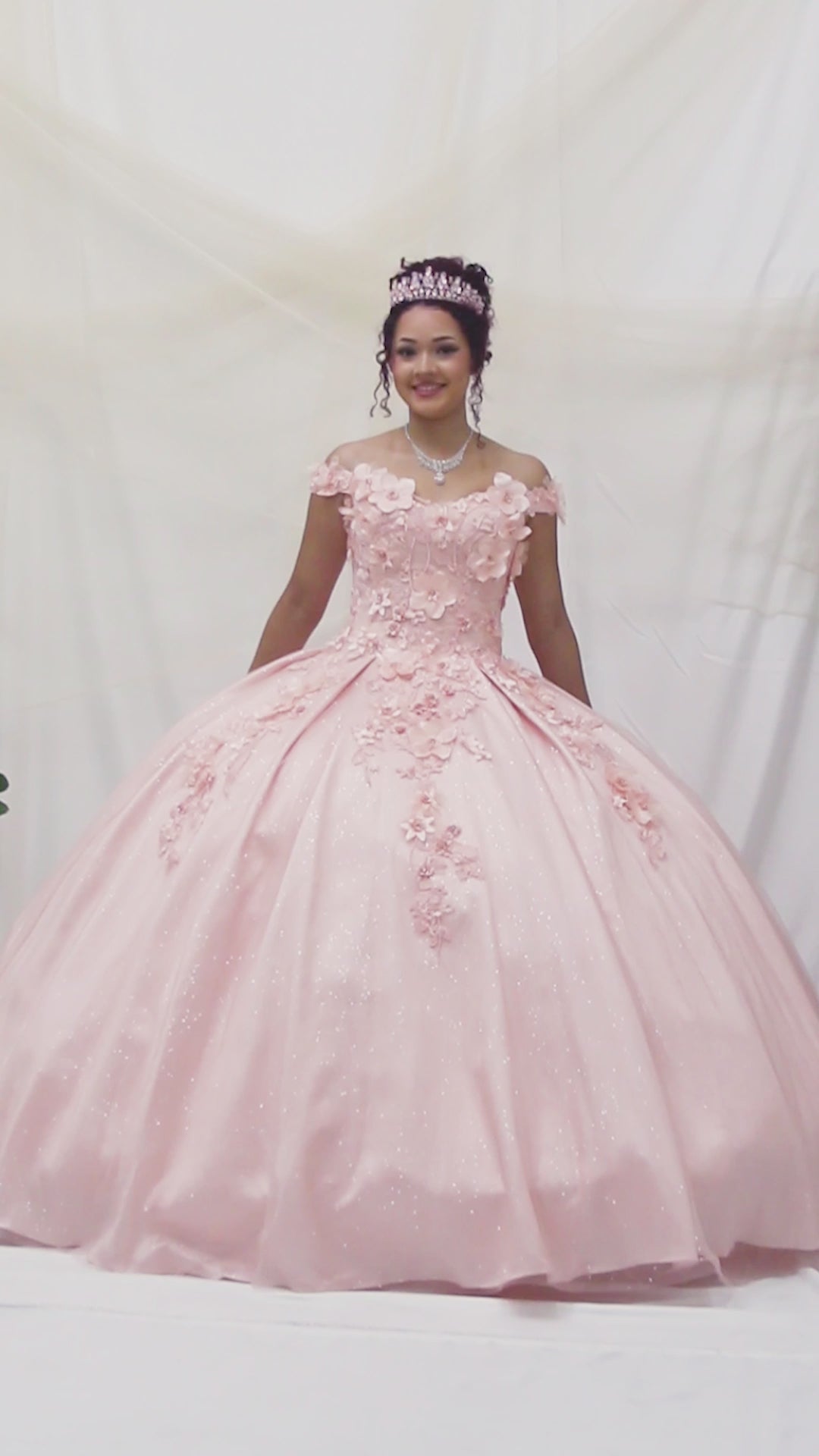 Video of Blush Quinceañera Dress with 3D Flower Appliques and Glittered Skirt
