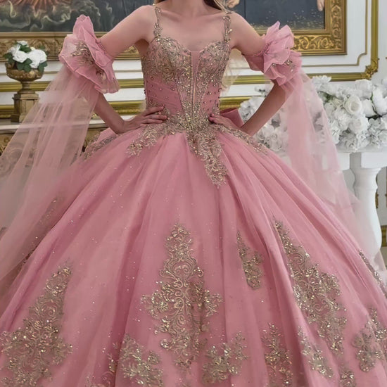 girl in a dusty rose quince dress in a room