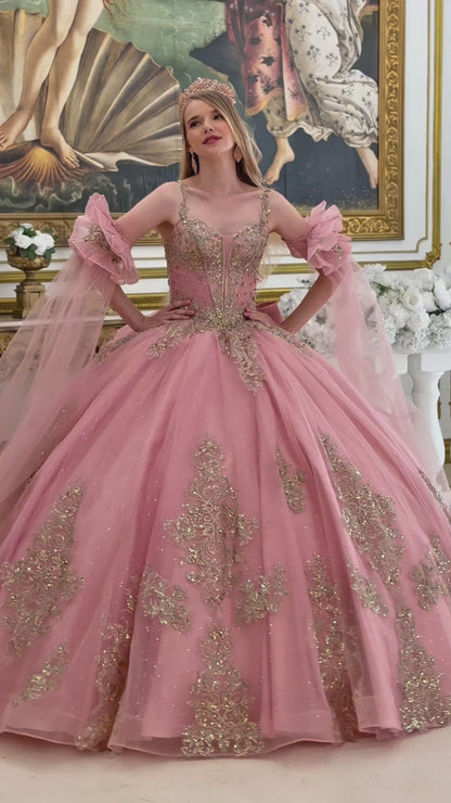 girl in a dusty rose quince dress in a room