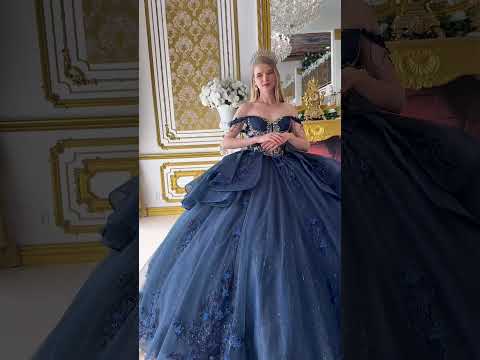 video of navy quince ball gown