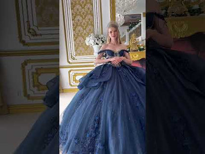 video of navy quince ball gown