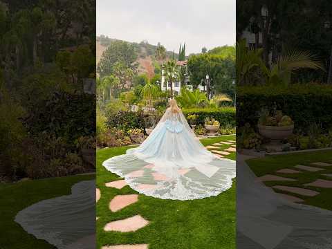 video of the dress; girl wearing the dress outdoor and smiling.