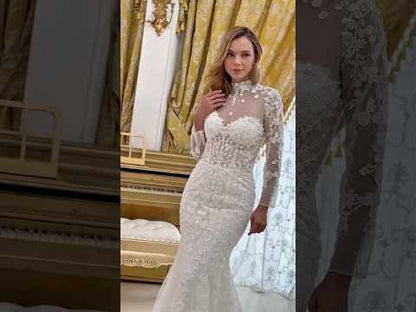 video of the trumpet wedding gown with long sleeves