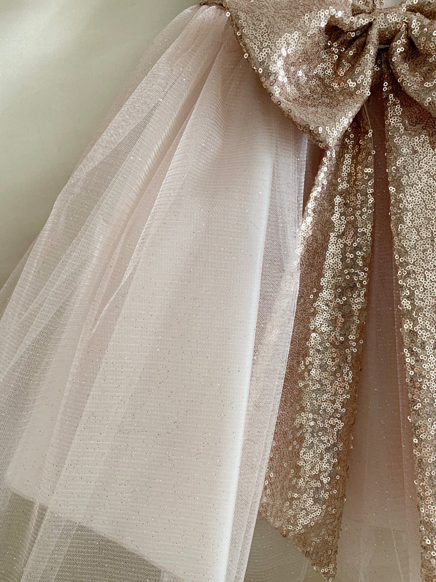 Rose Gold USA Made | Sequin V-Back Tulle Flower Girl Dress with detachable Ribbon pin - zoomed in view of bow