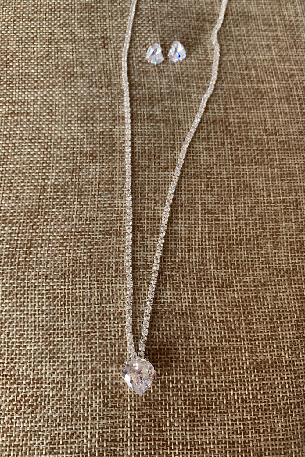 Silver rhinestone heart bridal, quinceañera and everyday women's necklace and earrings set.
