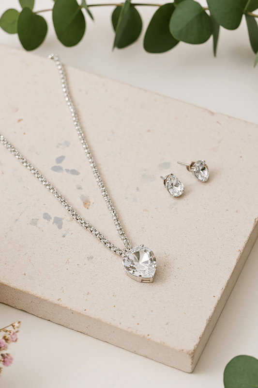 Silver rhinestone heart bridal, quinceañera and everyday women's necklace and earrings set.