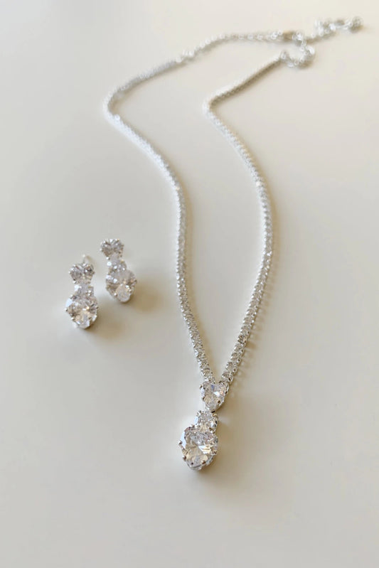 Silver rhinestone heart bridal necklace and earrings set.