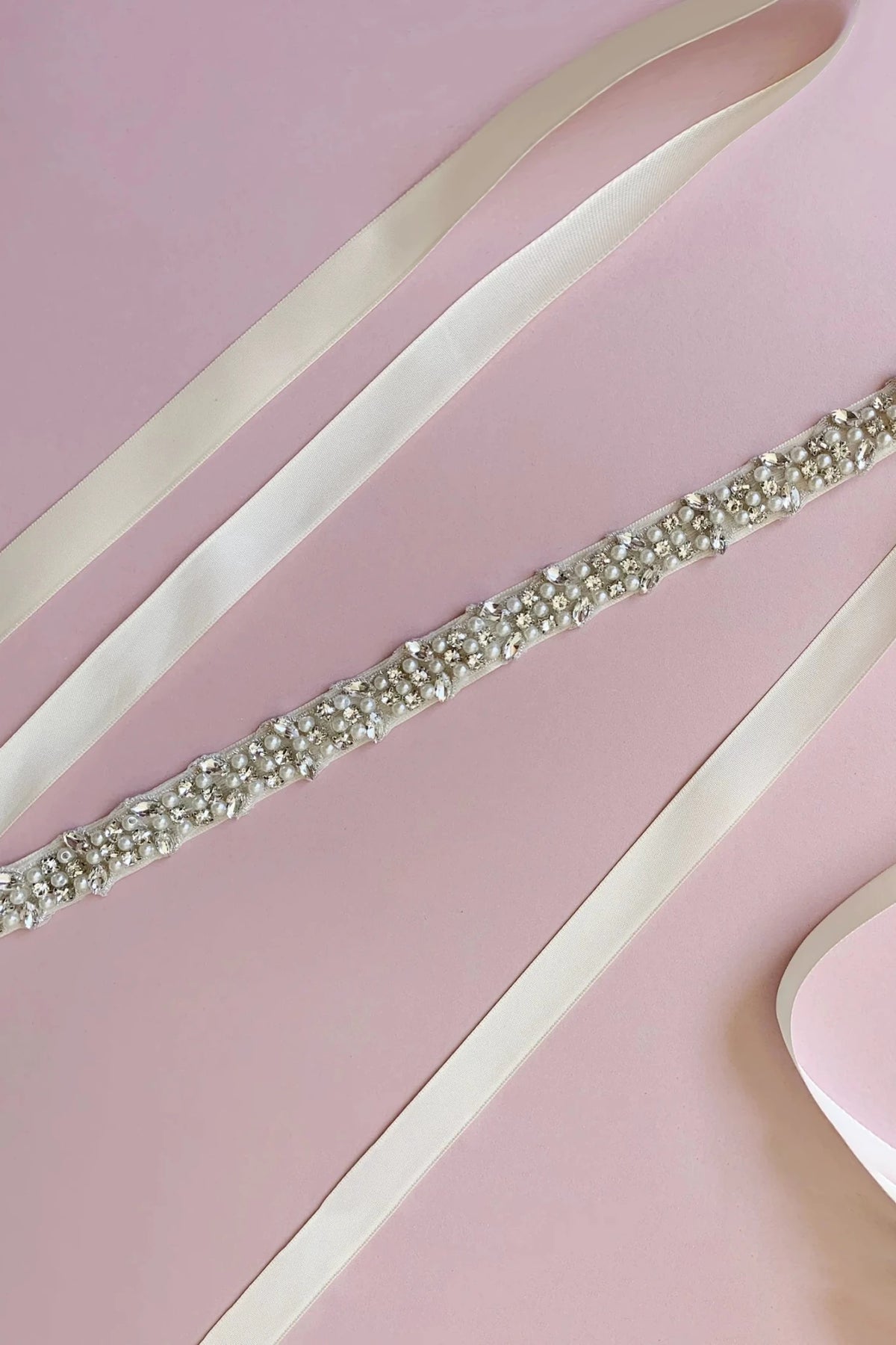 Ivory and white pearl rhinestone satin flower girl sash belt.