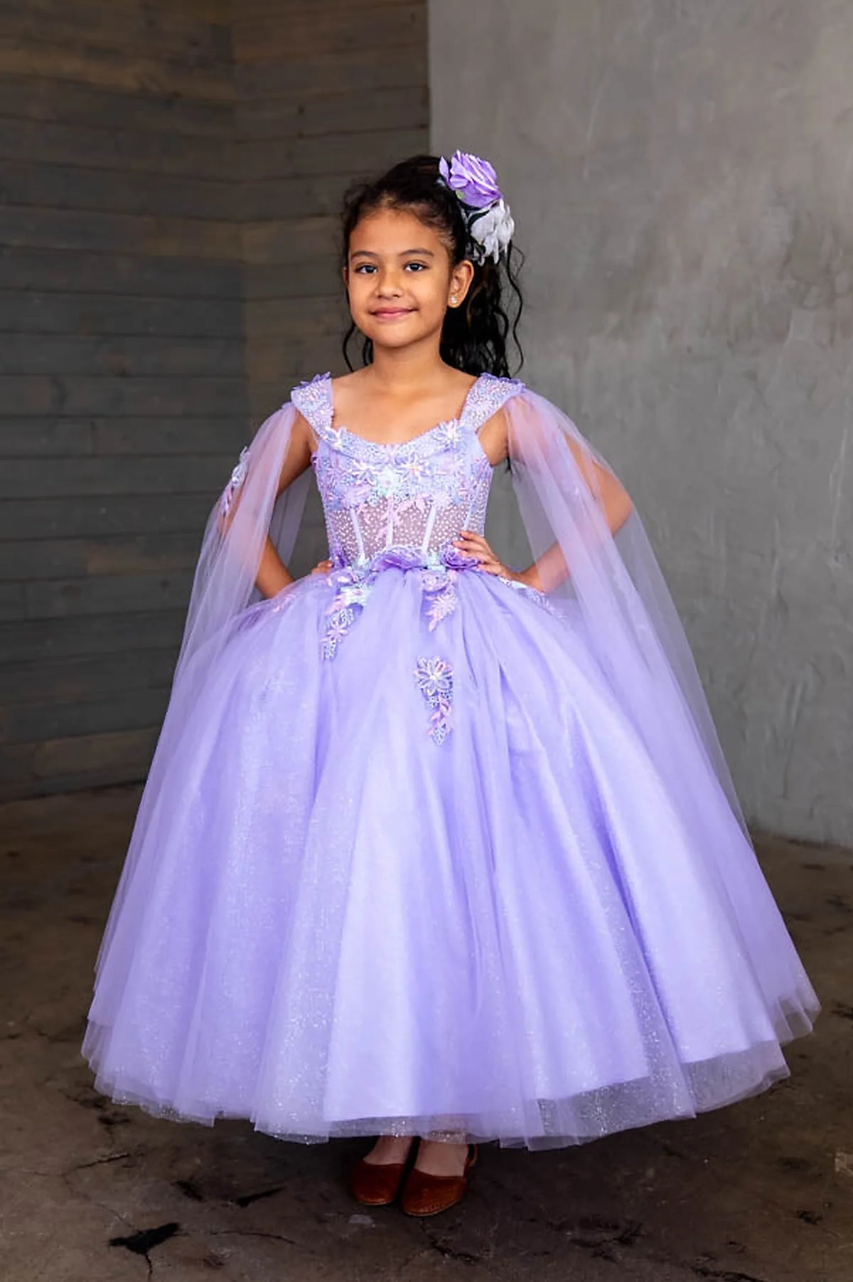 The additional image shows floral embroidered bodice and full tulle skirt on the Lilac mini quince dress.