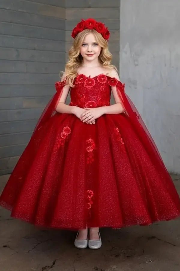 Front view of elegant burgundy mini quince dress with 3D floral design, removable cape sleeves, and voluminous layered skirt.