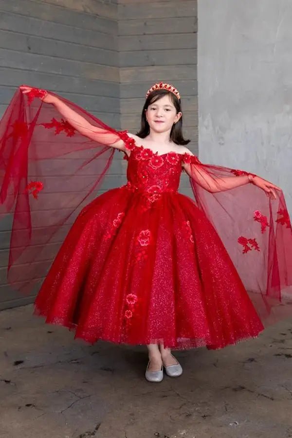Front view of burgundy mini quince dress with dimensional 3D floral bodice, detachable cape sleeves, and flowing skirt.