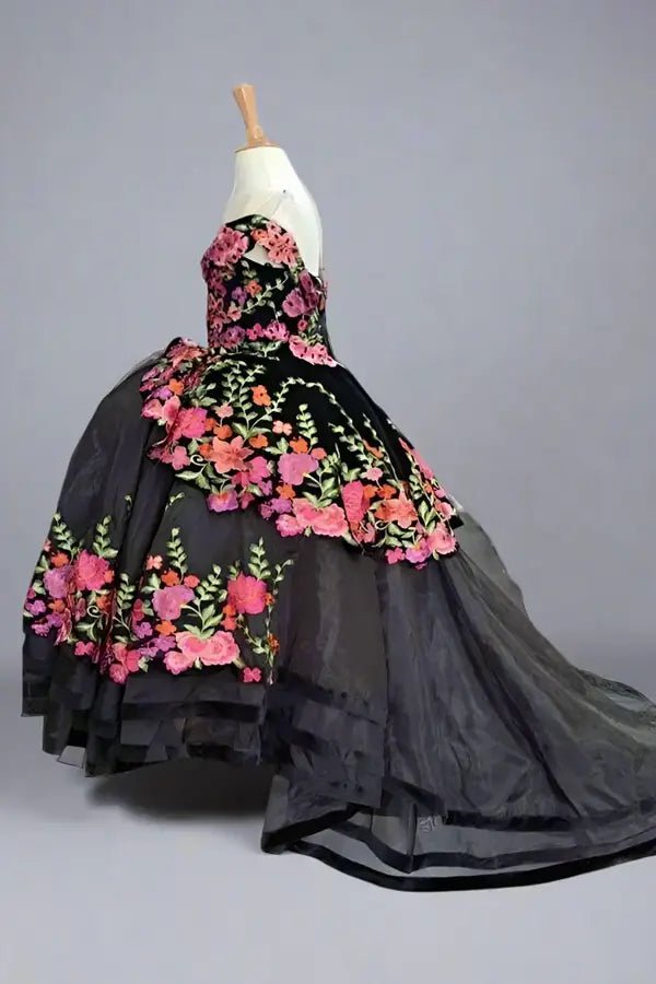 Side view of champagne mini quince dress with intricate embroidered layers, structured bodice, and flowing full skirt.