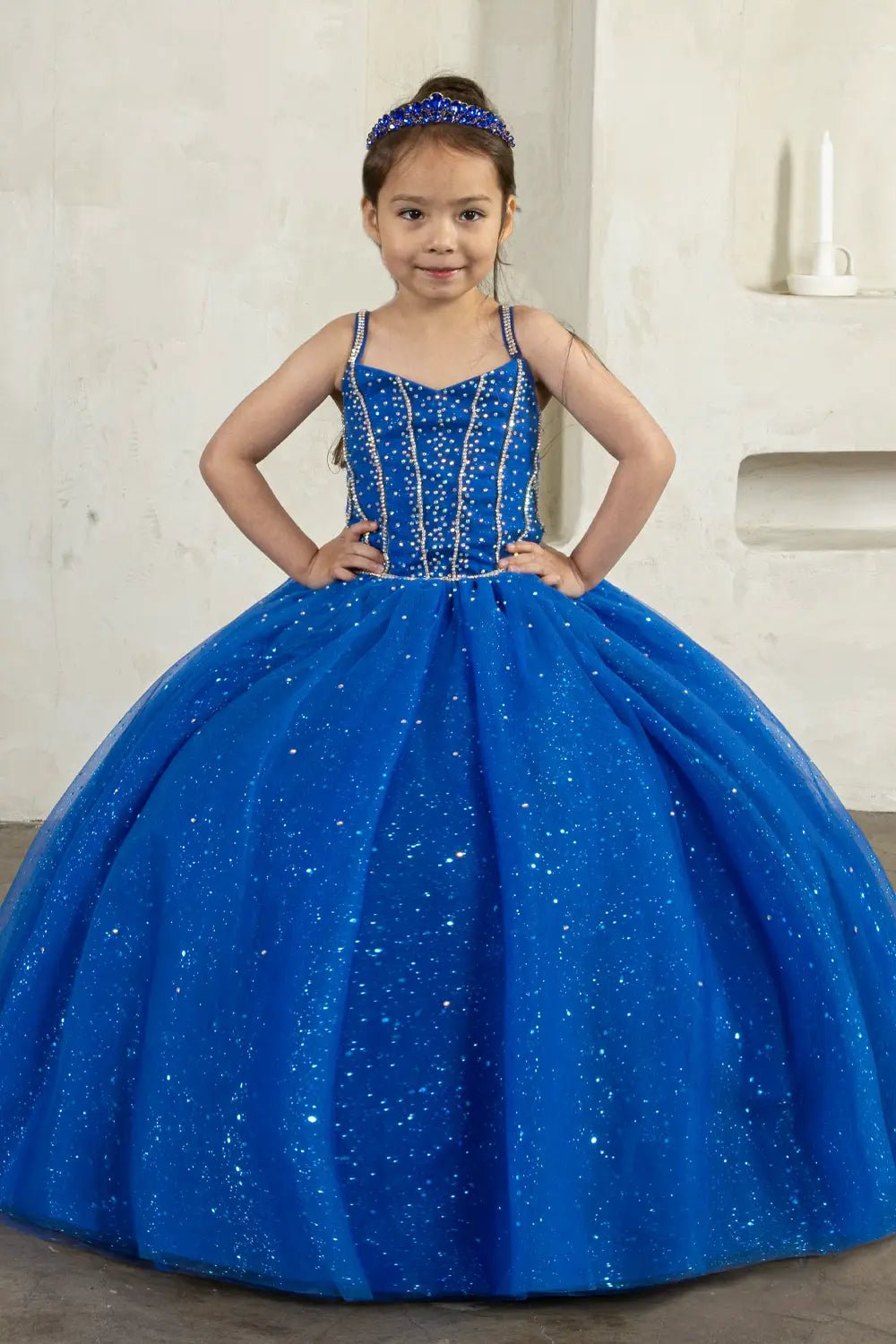 Front view of stunning royal blue mini quince dress with 3D floral appliqué bodice and glitter tulle layered skirt.