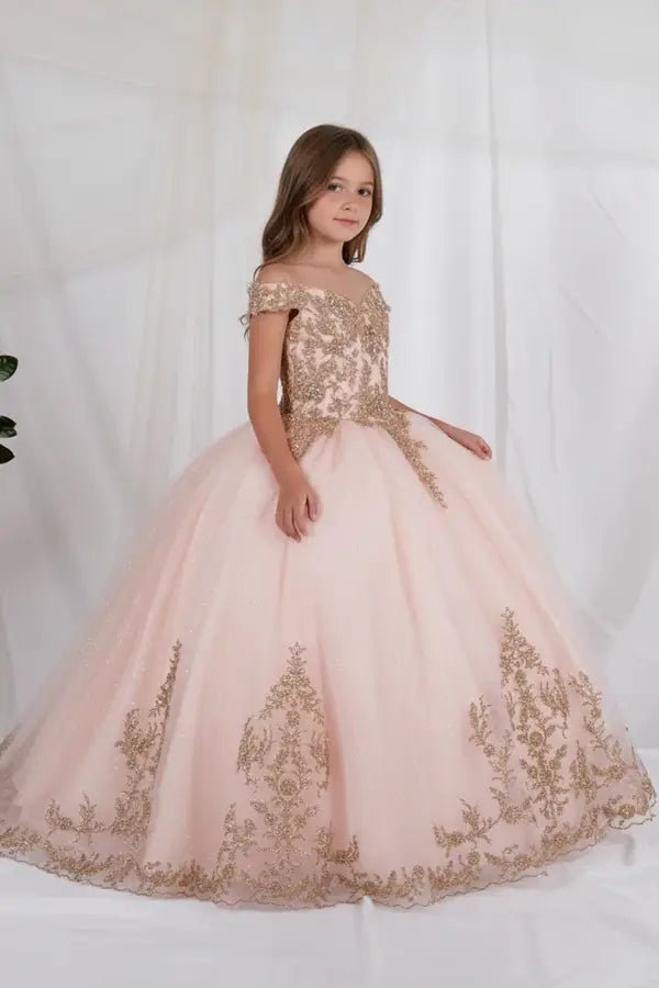 Side view of blush mini quince dress with intricate lace appliqué detail, shimmering glitter tulle, and flowing layered skirt.