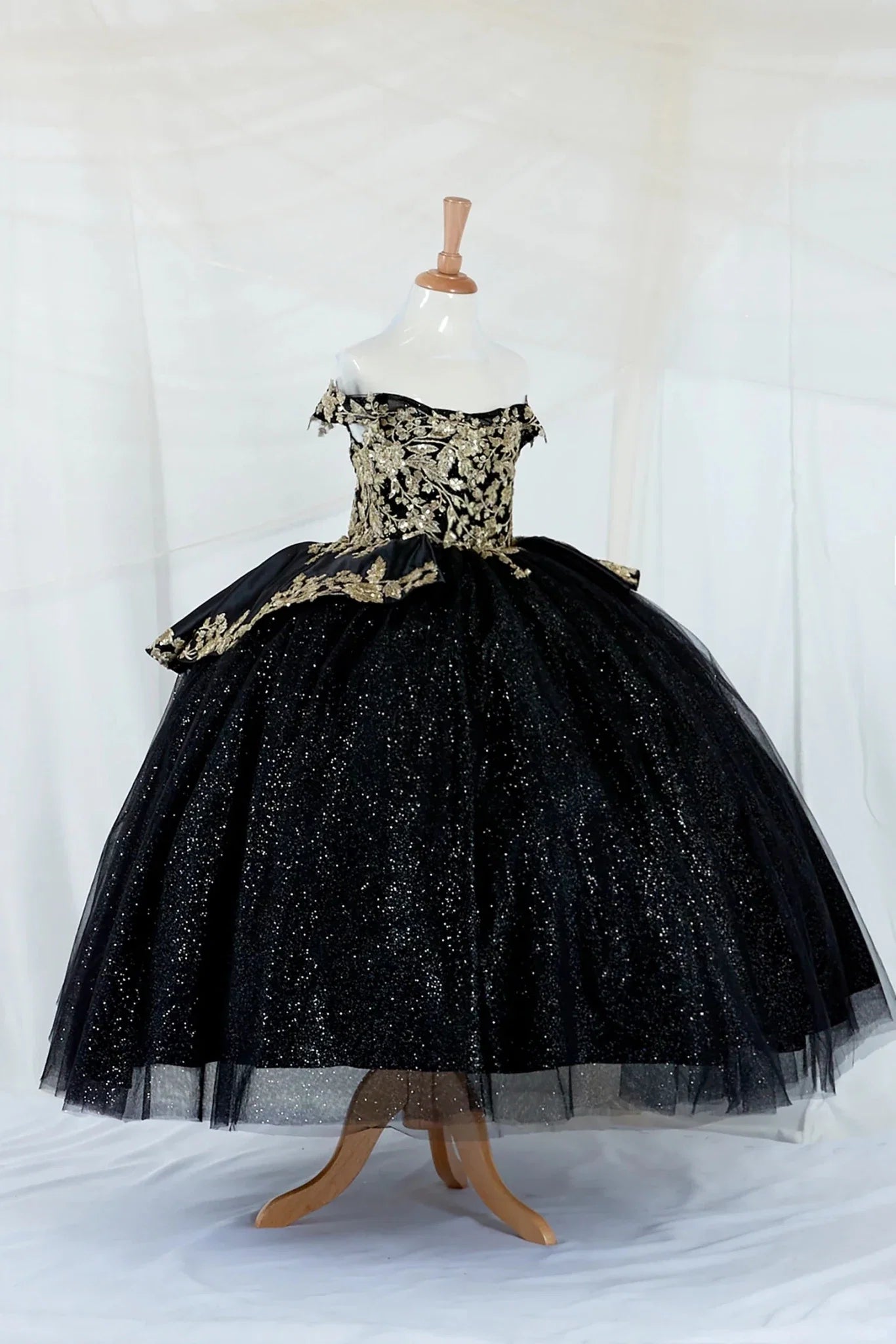 Front view of Navy Kids Dress with Gold Embroidery, Beaded and Layered Glitter Skirt, Mini Quince Dress.