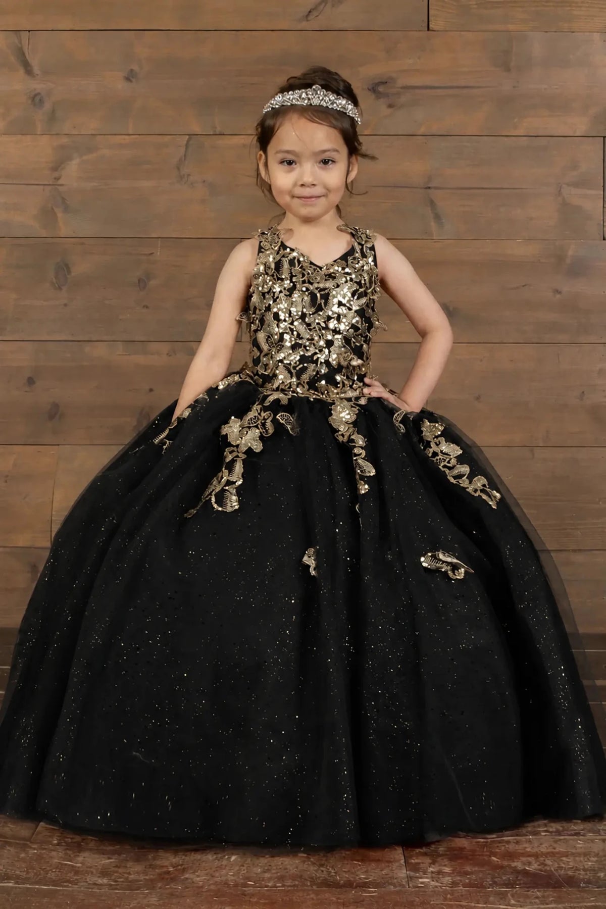 Black mini quince dress with 3D floral applique bodice and glitter tulle layered skirt.