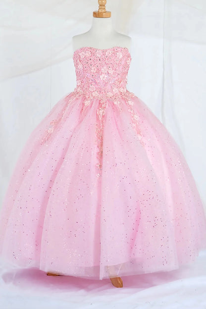 Front-facing display of a bubble-pink mini quince dress featuring a strapless 3D floral appliqué bodice and a full glitter tulle layered skirt.